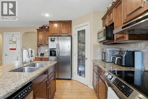 Kitchen - 197 West Creek Boulevard, Chestermere, AB - Indoor Photo Showing Kitchen With Double Sink