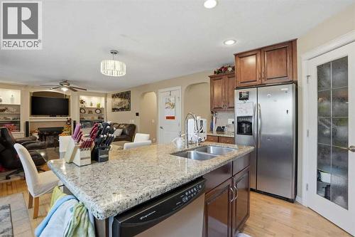 Kitchen - 197 West Creek Boulevard, Chestermere, AB - Indoor Photo Showing Kitchen With Double Sink