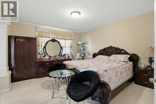 Primary Bedroom - 197 West Creek Boulevard, Chestermere, AB - Indoor Photo Showing Bedroom