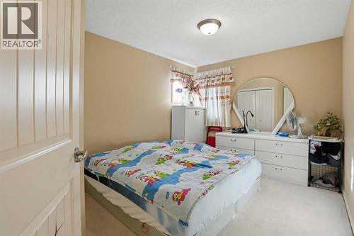 Bedroom 4 - 197 West Creek Boulevard, Chestermere, AB - Indoor Photo Showing Bedroom