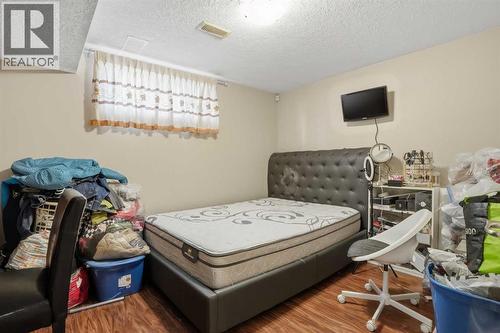 Bedroom 5 - 197 West Creek Boulevard, Chestermere, AB - Indoor Photo Showing Bedroom
