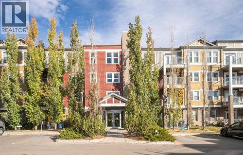 304, 2300 Evanston Square Nw, Calgary, AB - Outdoor With Balcony With Facade