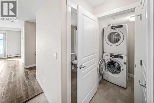 304, 2300 Evanston Square Nw, Calgary, AB - Indoor Photo Showing Laundry Room