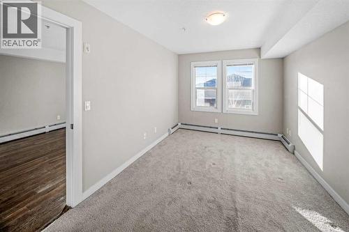 304, 2300 Evanston Square Nw, Calgary, AB - Indoor Photo Showing Other Room