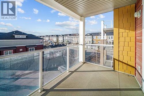 304, 2300 Evanston Square Nw, Calgary, AB - Outdoor With Balcony With Exterior