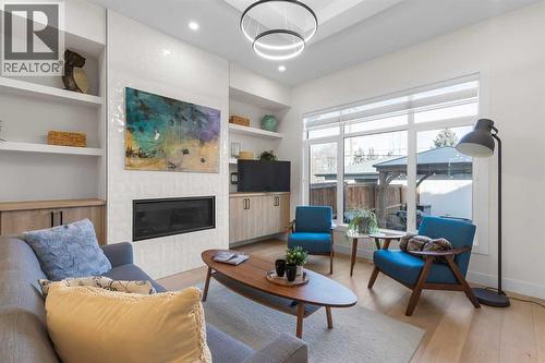 2520 Cochrane Road Nw, Calgary, AB - Indoor Photo Showing Living Room With Fireplace