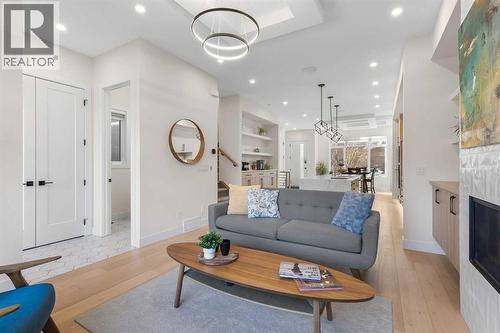 2520 Cochrane Road Nw, Calgary, AB - Indoor Photo Showing Living Room With Fireplace