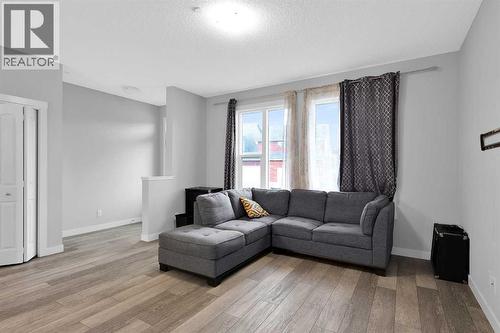 349 Calhoun Common Ne, Calgary, AB - Indoor Photo Showing Living Room