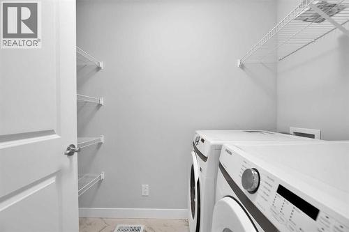 349 Calhoun Common Ne, Calgary, AB - Indoor Photo Showing Laundry Room