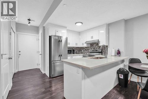 349 Calhoun Common Ne, Calgary, AB - Indoor Photo Showing Kitchen With Double Sink With Upgraded Kitchen