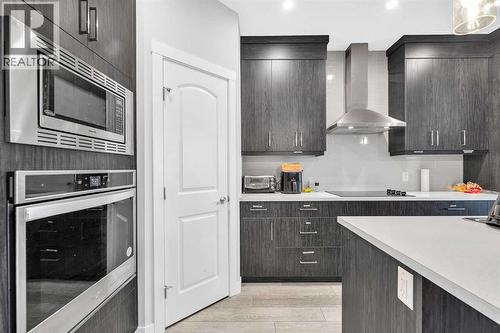 349 Calhoun Common Ne, Calgary, AB - Indoor Photo Showing Kitchen With Upgraded Kitchen