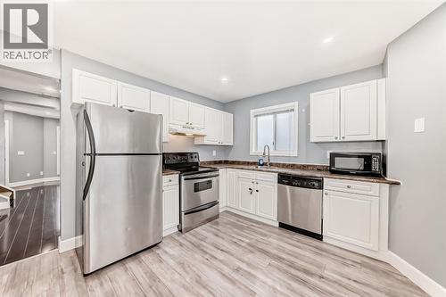 131 Taradale Drive Ne, Calgary, AB - Indoor Photo Showing Kitchen