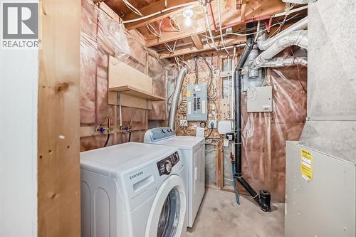 131 Taradale Drive Ne, Calgary, AB - Indoor Photo Showing Laundry Room