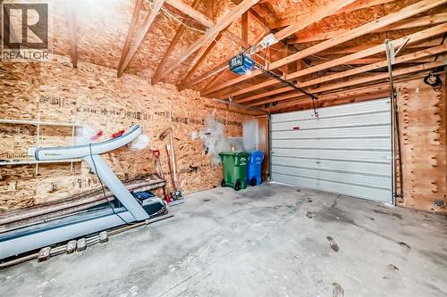131 Taradale Drive Ne, Calgary, AB - Indoor Photo Showing Garage
