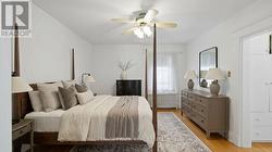 Staged with AI- Primary Bedroom - 