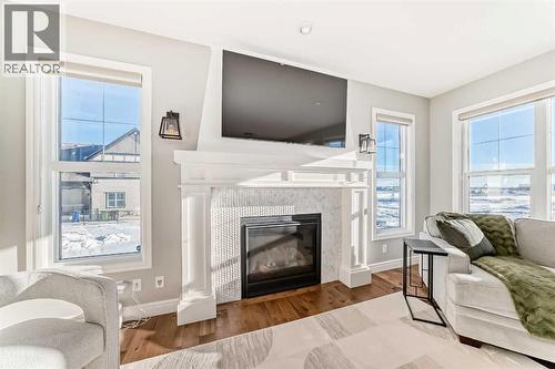 35 Mahogany Crescent Se, Calgary, AB - Indoor Photo Showing Living Room With Fireplace