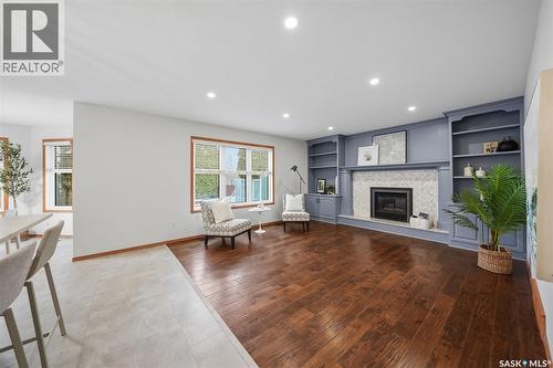 214 Braeburn Place, Saskatoon, SK - Indoor Photo Showing Living Room With Fireplace