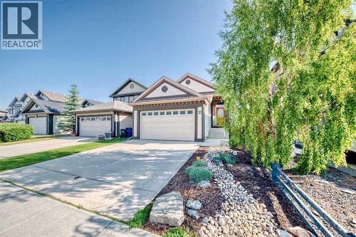 65 Sunset Heights, Cochrane, AB - Outdoor With Facade