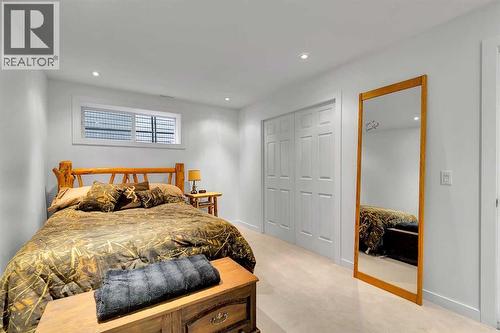 65 Sunset Heights, Cochrane, AB - Indoor Photo Showing Bedroom