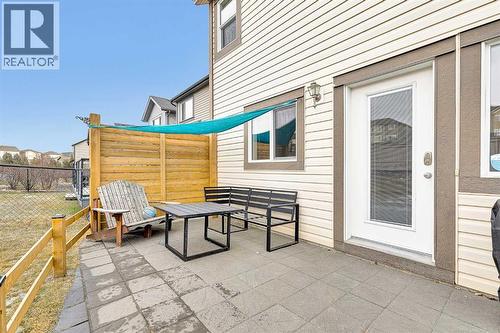 65 Sunset Heights, Cochrane, AB - Outdoor With Deck Patio Veranda With Exterior