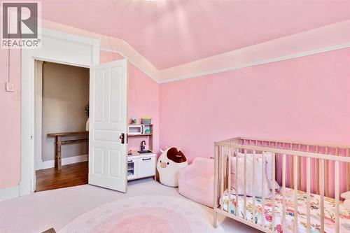 725 Macleod Trail Sw, High River, AB - Indoor Photo Showing Bedroom