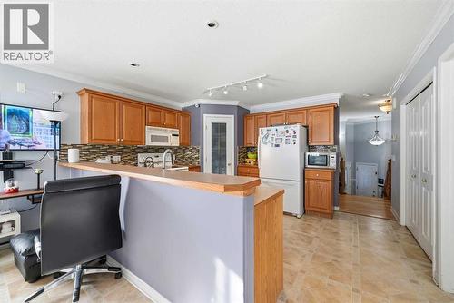 311 Saddlecreek Point Ne, Calgary, AB - Indoor Photo Showing Kitchen