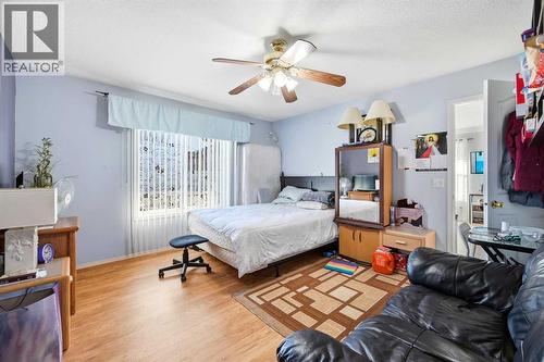 311 Saddlecreek Point Ne, Calgary, AB - Indoor Photo Showing Bedroom