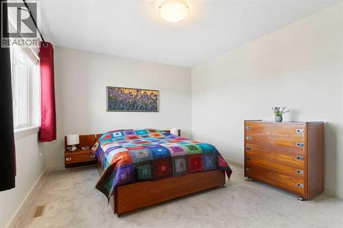 167 Fireside Drive, Cochrane, AB - Indoor Photo Showing Bedroom
