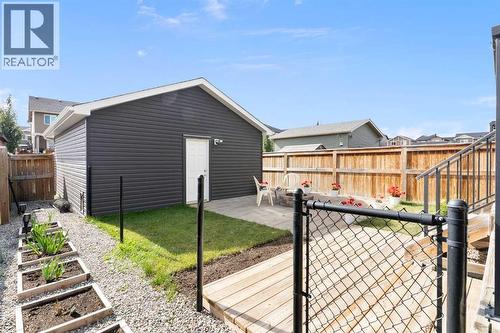 167 Fireside Drive, Cochrane, AB - Outdoor With Deck Patio Veranda With Exterior