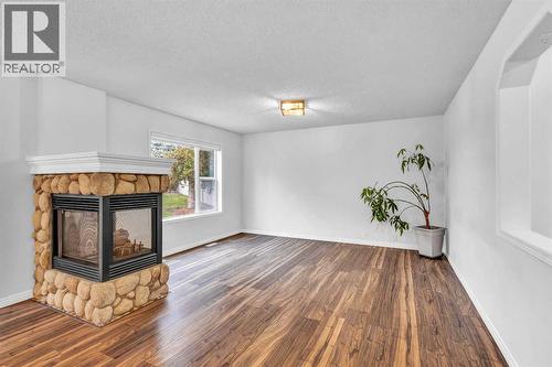 331 Springbank Place Sw, Calgary, AB - Indoor With Fireplace