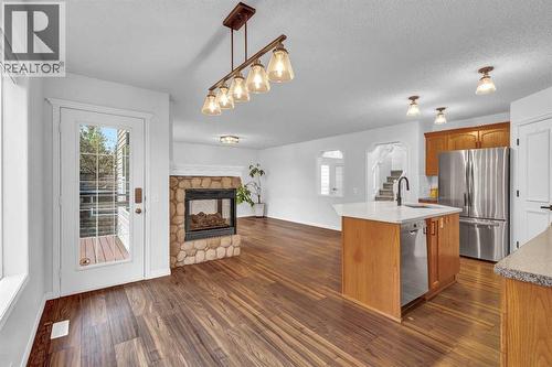 331 Springbank Place Sw, Calgary, AB - Indoor With Fireplace