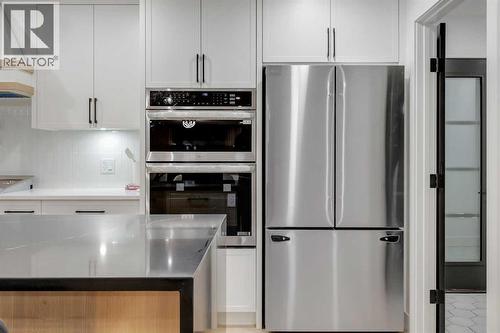 9419 Academy Drive Se, Calgary, AB - Indoor Photo Showing Kitchen With Upgraded Kitchen