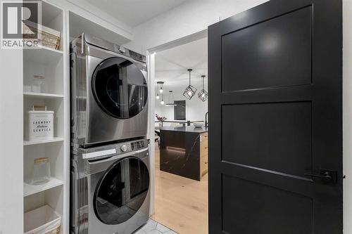 9419 Academy Drive Se, Calgary, AB - Indoor Photo Showing Laundry Room