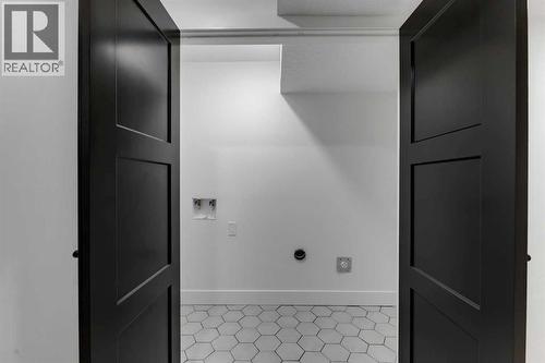 Basement Laundry RI - 9419 Academy Drive Se, Calgary, AB - Indoor