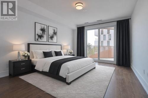 VIRTUALLY STAGED - 214 - 155 Merchants' Wharf, Toronto, ON - Indoor Photo Showing Bedroom