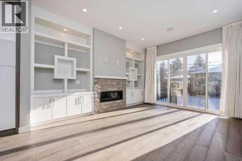 219 19 Avenue Nw, Calgary, AB - Indoor With Fireplace
