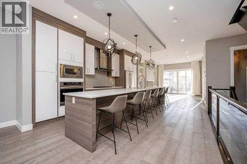 219 19 Avenue Nw, Calgary, AB - Indoor Photo Showing Kitchen With Upgraded Kitchen