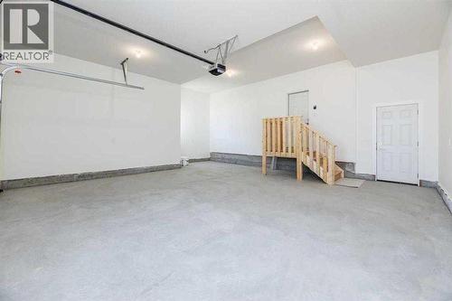 55 Everson Close, Red Deer, AB - Indoor Photo Showing Garage