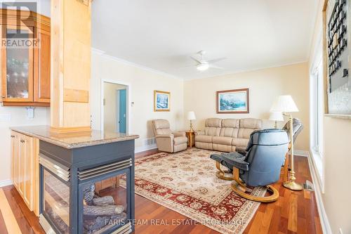 24 Finley Drive, Tiny, ON - Indoor Photo Showing Living Room With Fireplace