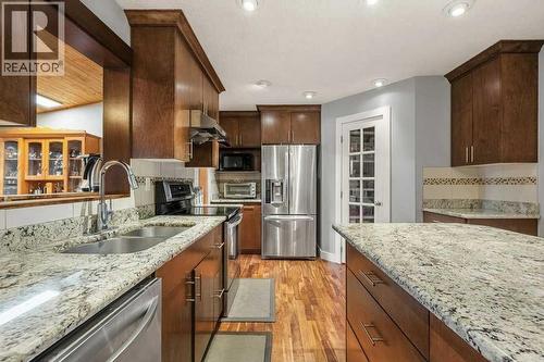 4704 Marbury Place Ne, Calgary, AB - Indoor Photo Showing Kitchen With Stainless Steel Kitchen With Double Sink With Upgraded Kitchen