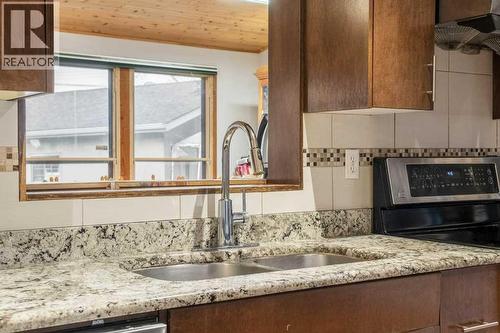 4704 Marbury Place Ne, Calgary, AB - Indoor Photo Showing Kitchen With Double Sink With Upgraded Kitchen