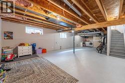 Partially finished basement with drywall and rough-in for barhroom - 