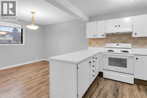 1418 Ranchlands Road Nw, Calgary, AB - Indoor Photo Showing Kitchen