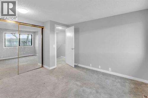 1418 Ranchlands Road Nw, Calgary, AB - Indoor Photo Showing Other Room