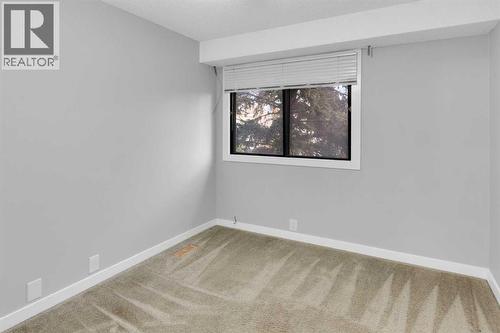 1418 Ranchlands Road Nw, Calgary, AB - Indoor Photo Showing Other Room