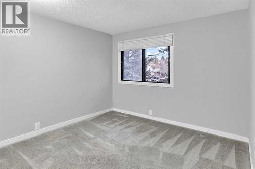 1418 Ranchlands Road Nw, Calgary, AB - Indoor Photo Showing Other Room