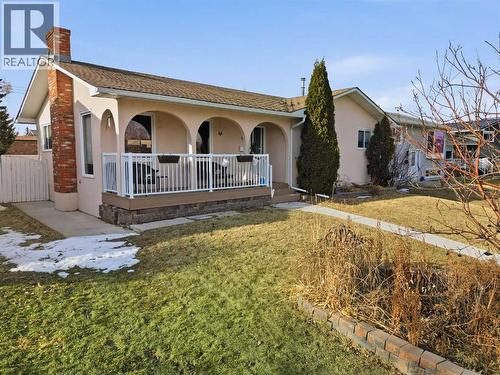 63 Huntmeadow Road Ne, Calgary, AB - Outdoor With Deck Patio Veranda
