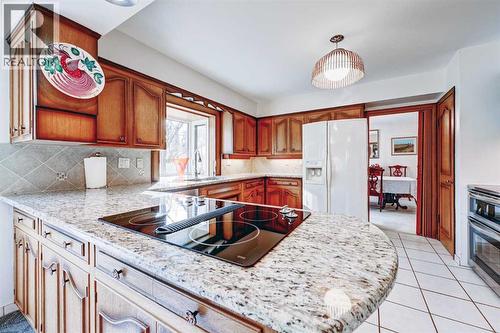 1111 Beverley Boulevard Sw, Calgary, AB - Indoor Photo Showing Kitchen With Double Sink