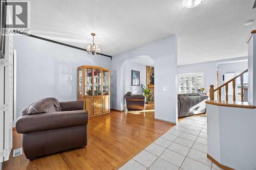 244 Oakmere Place, Chestermere, AB - Indoor Photo Showing Living Room