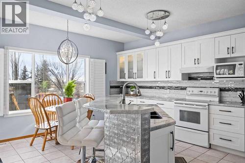 244 Oakmere Place, Chestermere, AB - Indoor Photo Showing Kitchen With Double Sink